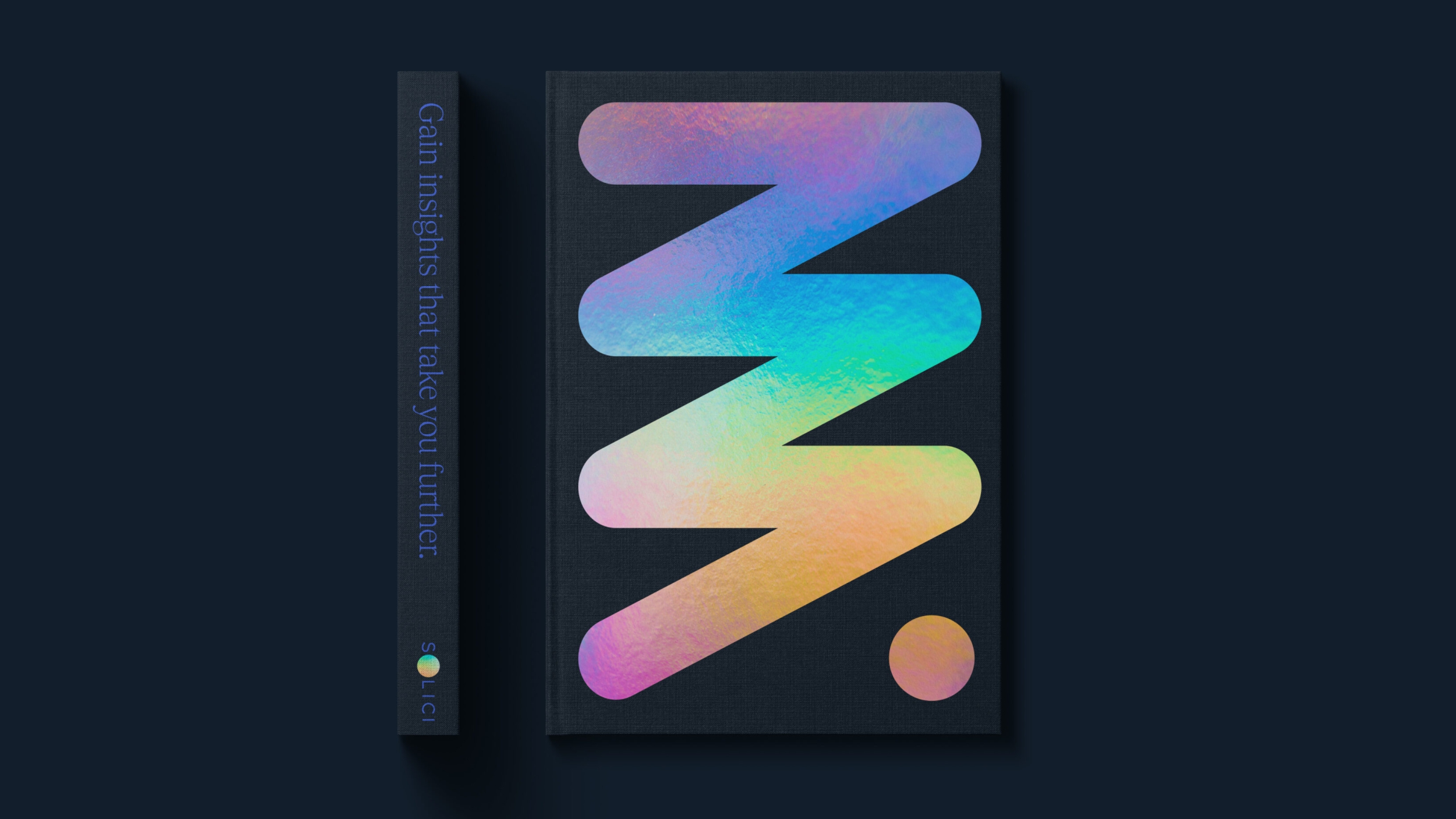 A large bubbled zigzag of shiny gradiented colours of pink to blue, to light green, to yellow to orange dominate the front cover of a hardback book. A single dot of the same fill like a full stop in in the bottom-right corner.